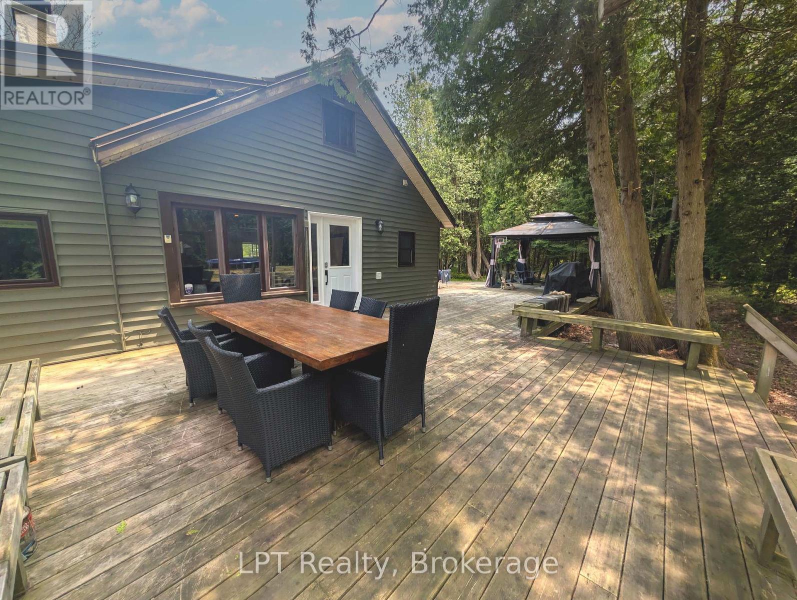Dining table set on the deck at 21 Tyson Lane