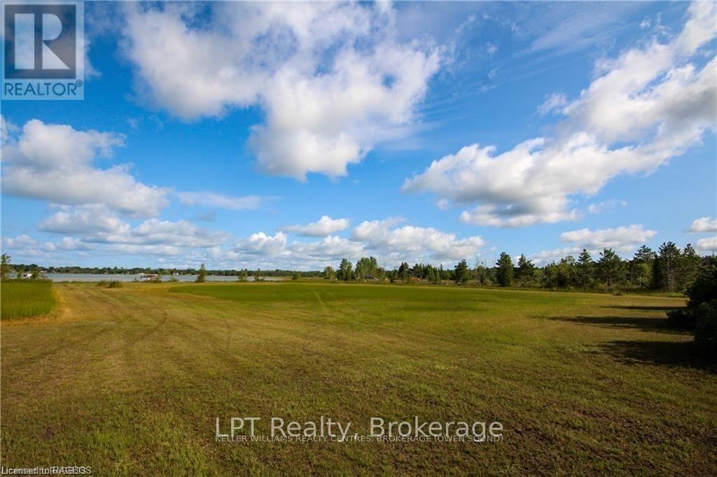 The shoreline and open water of Howdenvale Bay from the property