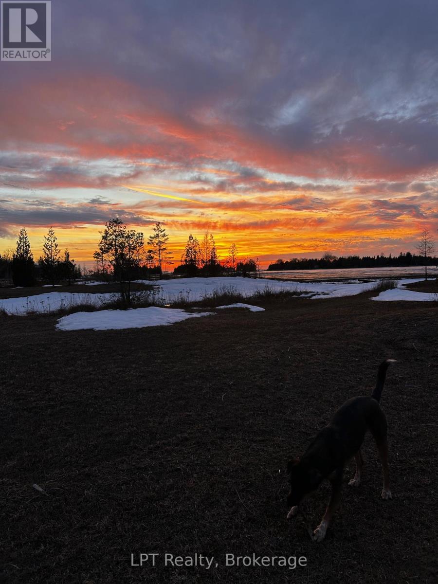 Sunset over the shoreline at 21 Tyson Lane